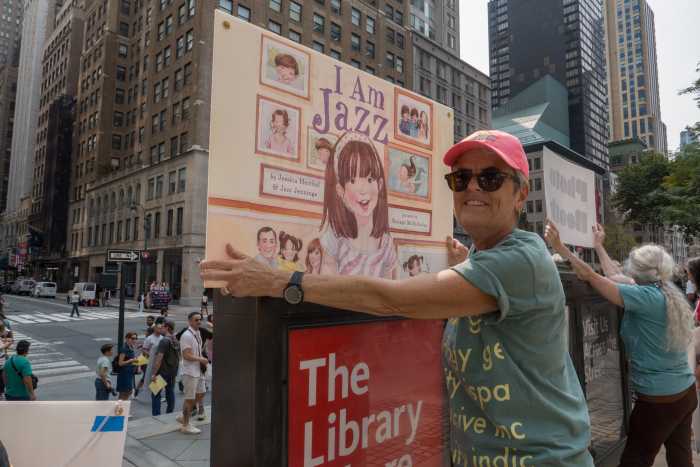 Activists showcase banned books outside of the New York Public Library.