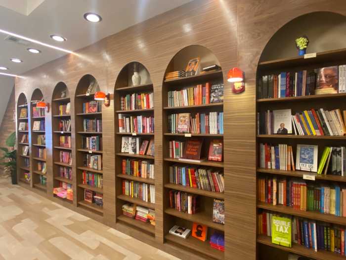 The upstairs area at Gladys Books & Wine features bookshelves.