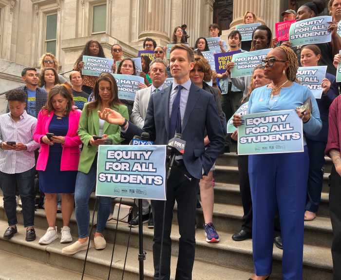 Councilmember Erik Bottcher speaks at a Sept. 30 rally against the Trump administration's anti-trans funding cuts.