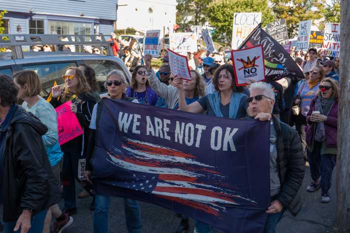 Marching at the "No Kings" demonstration.