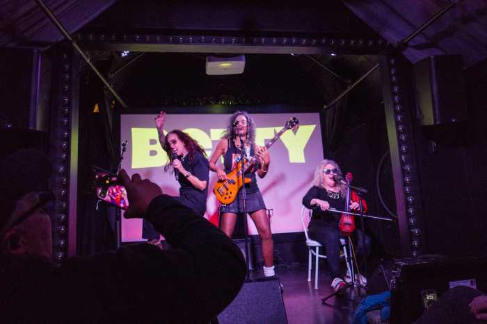 Betty performs on stage for Women's Week.