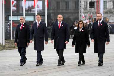 Polish President Karol Nawrocki, Deputy Prime Minister and Defence Minister Wladyslaw Kosiniak-Kamysz, Senate Marshal Malgorzata Kidawa-Blonska, Sejm Marshal Szymon Holownia and Deputy Prime Minister and Digital Affairs Minister Krzysztof Gawkowski attend a ceremonial changing of the guard at the Tomb of the Unknown Soldier during Independence Day celebrations in Warsaw, Poland, November 11, 2025.