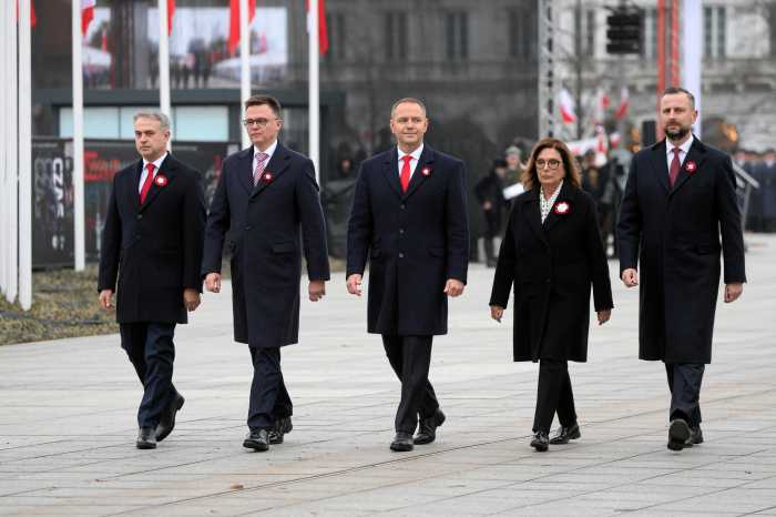 Polish President Karol Nawrocki, Deputy Prime Minister and Defence Minister Wladyslaw Kosiniak-Kamysz, Senate Marshal Malgorzata Kidawa-Blonska, Sejm Marshal Szymon Holownia and Deputy Prime Minister and Digital Affairs Minister Krzysztof Gawkowski attend a ceremonial changing of the guard at the Tomb of the Unknown Soldier during Independence Day celebrations in Warsaw, Poland, November 11, 2025.