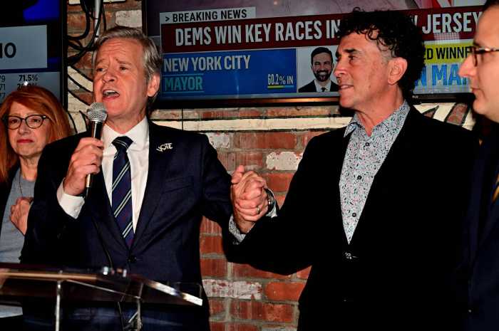 Brad Hoylman-Sigal (left) with his husband, David Sigal, on election night.