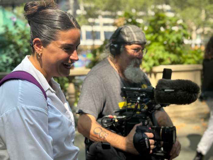 Caitlin M. Krenn (left) and Charlie Spickler behind the scenes of "Outcast Nation."