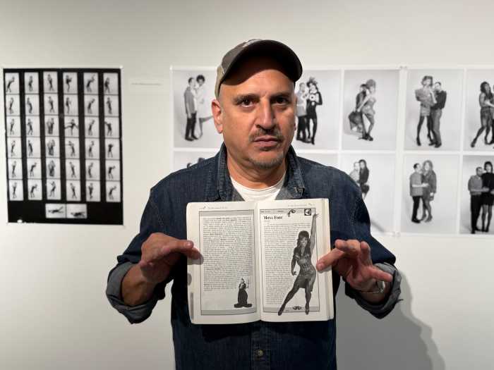 Julian Fleisher shows a page about Mona Foot in "The Drag Queens of New York: An Illustrated Field Guide."