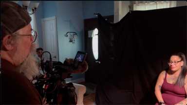 Filmmaker Charlie Spickler (left) on the set of "Outcast Nation."