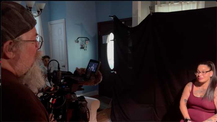 Filmmaker Charlie Spickler (left) on the set of "Outcast Nation."