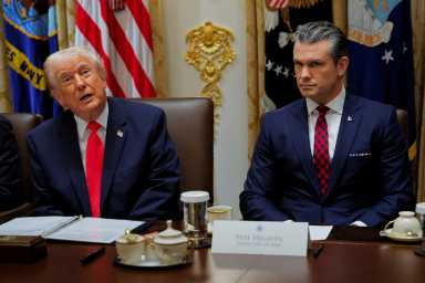 US President Donald Trump attends a cabinet meeting with US Secretary of Defense Pete Hegseth at the White House in Washington, D.C., U.S., December 2, 2025.
