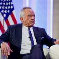 US Secretary of Health and Human Services Robert F. Kennedy Jr. speaks with US Vice President JD Vance (not pictured) during the inaugural Make America Healthy Again summit in Washington, D.C., U.S., November 12, 2025.