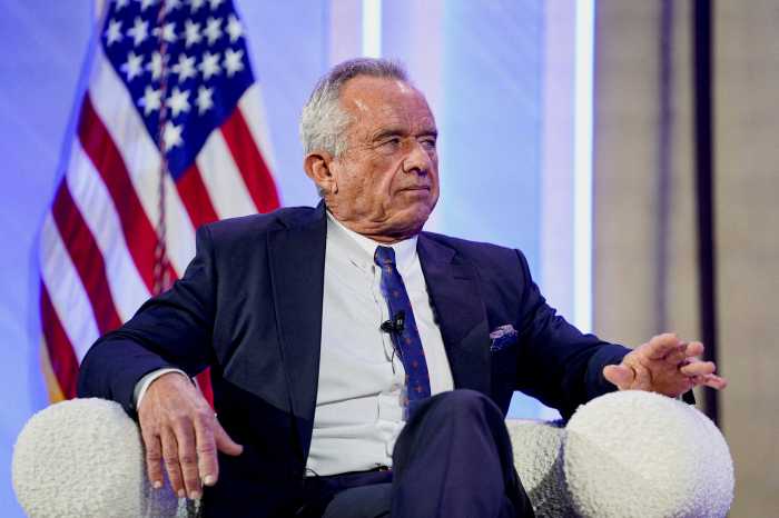 US Secretary of Health and Human Services Robert F. Kennedy Jr. speaks with US Vice President JD Vance (not pictured) during the inaugural Make America Healthy Again summit in Washington, D.C., U.S., November 12, 2025.