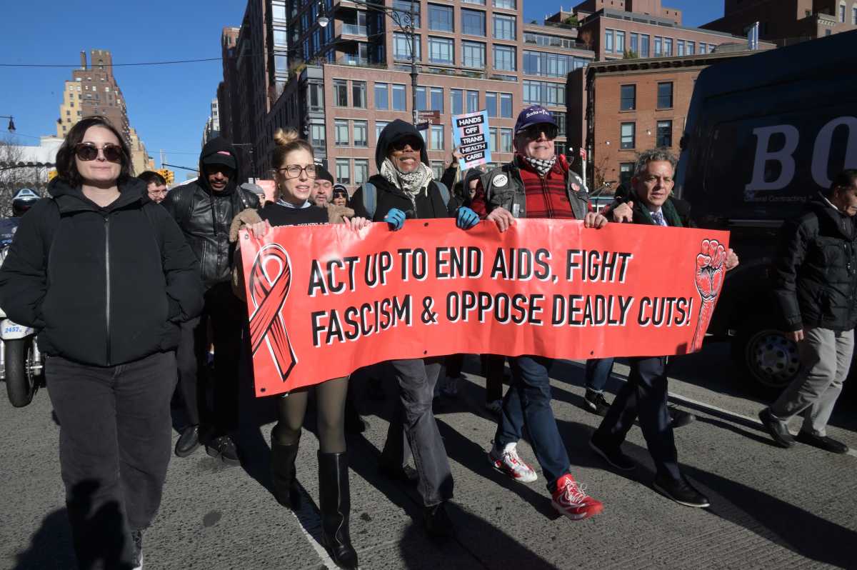 An afternoon march on World AIDS Day featured a die-in in front of the Stonewall Inn.