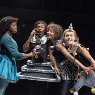 Anu Ogunmefun (Ensemble), Nina Cassells (Pauline), Sienna Arif Knights (Petrova), and Scarlett Monahan (Posy) star in "Ballet Shoes" at the Olivier.