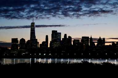 The skyline of Lower Manhattan is seen at dawn from across the Hudson River in New York City, U.S., October 18, 2025.