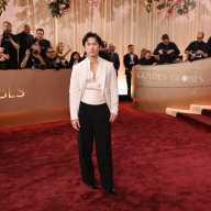 Hudson Williams poses on the red carpet at the 83rd Annual Golden Globes in Beverly Hills, California, U.S., January 11, 2026.