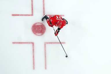 Carolina Hurricanes defenseman Alexander Nikishin (21) skates with the puck against the Chicago Blackhawks first period at Lenovo Center. Mandatory Credit: