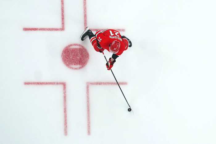 Carolina Hurricanes defenseman Alexander Nikishin (21) skates with the puck against the Chicago Blackhawks first period at Lenovo Center. Mandatory Credit: