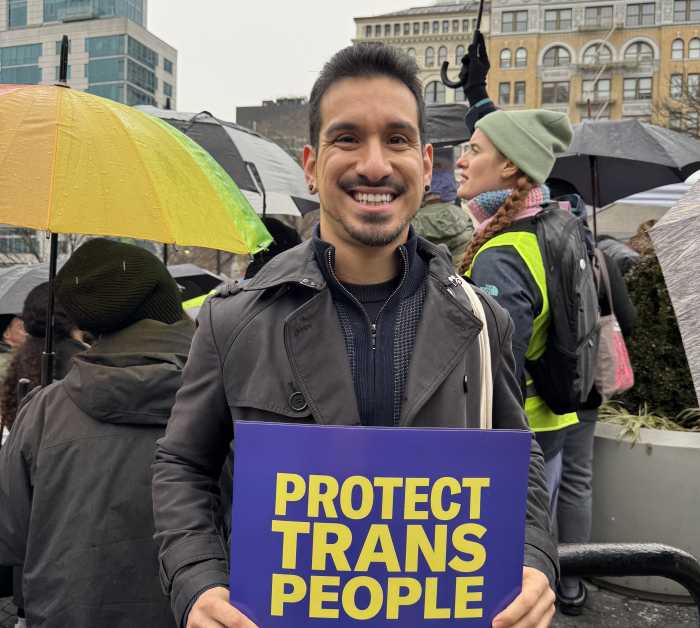 Brian Romero, seen here at a rally for trans youth on Jan. 10, is running for office in the 34th Assembly District.