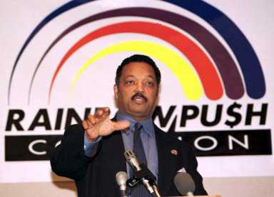 Rev. Jesse Jackson speaks at a news conference in New York, U.S. January 15, 1997 to announce an accord on the boycott of Mitsubishi Motors products and the company's work force diversity efforts.
