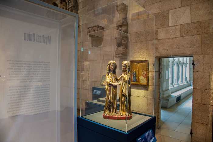 The Visitation, a 14th Century statue, depicts the Virgin Mary pregnant with Jesus, holding hands with her cousin Elizabeth, simultaneously pregnant with her own child who would become John the Baptist. The imagery can be interpreted through the lens of same-sex desire among other themes, according to the co-curators. 