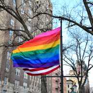 The Rainbow Flag stands tall at the Stonewall National Monument.
