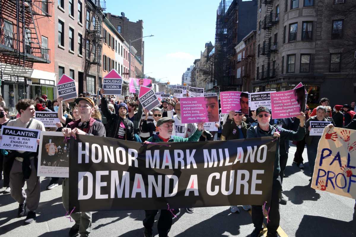 ACT UP members march through Manhattan on March 21 to mark the organization's 39th anniversary and honor the life of Mark Milano.