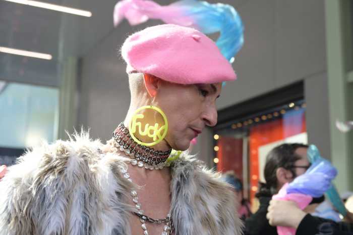 Many marchers wore the colors of the Trans Flag.