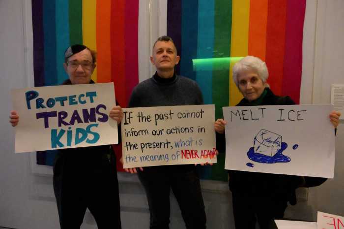 Before service, individuals were encouraged to make signs for the No Kings March on March 28.