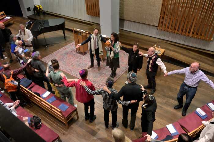 Individuals join together at CBST.