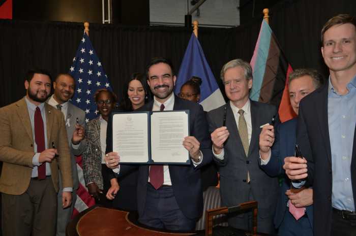 Mayor Zohran Mamdani signs an executive order establishing the new Office of LGBTQIA+ Affairs.