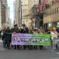 From L to R: Michael-Vincent Crea, Thomas O’Grady, Michael Kane, Caitlin Herrity, Jack Schlossberg, Clover Welsh, Layla Law Gisiko, David Warren, Brendan Fay, Dr. John Lahey, Aaron Pesin, Abby Donley, Nicholas Dodd, Sheila and Meghan Brophy on Fifth Avenue.