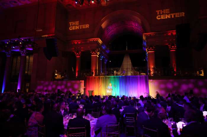 Members of the audience look on during The Center's dinner on April 16.