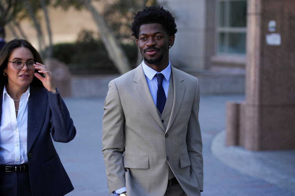 Grammy-winning musician Lil Nas X leaves court after a preliminary hearing on four felony charges for allegedly assaulting and resisting police officers responding to an incident in August when police approached him while he was reportedly walking nearly naked on the streets of Los Angeles, in Van Nuys, Los Angeles, California, U.S. March 12, 2026.