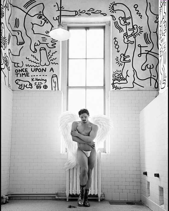 An angel stands near the window in the Keith Haring bathroom at The Center.