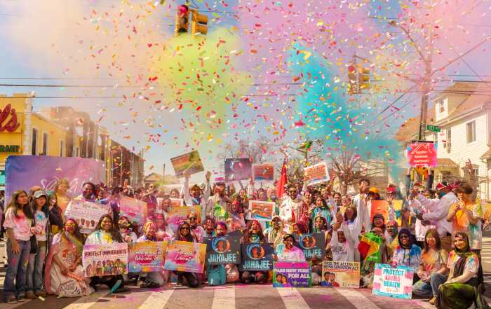 Colors burst in the air at the 2026 Phagwah Parade in Queens.