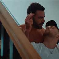 David Tag (as Jake), left, with Benji (as Lloyd Eyre-Morgan) in "Departures."