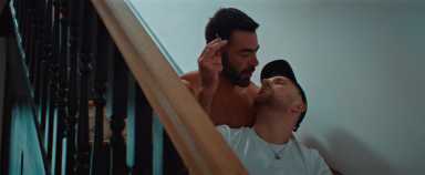 David Tag (as Jake), left, with Benji (as Lloyd Eyre-Morgan) in "Departures."