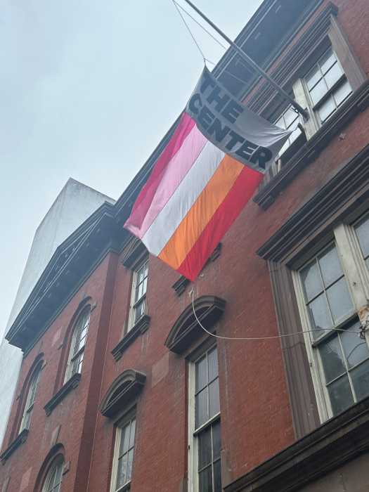 The lesbian flag flies above The Center in observance of Lesbian Visibility Week.