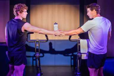 Jay Armstrong Johnson and Jimin Moon in “Heated Rivalry: The Unauthorized Musical Parody”