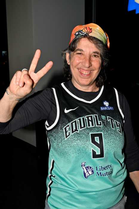 Ellen Neipris dons a customized Liberty jersey with the phrase "equality."