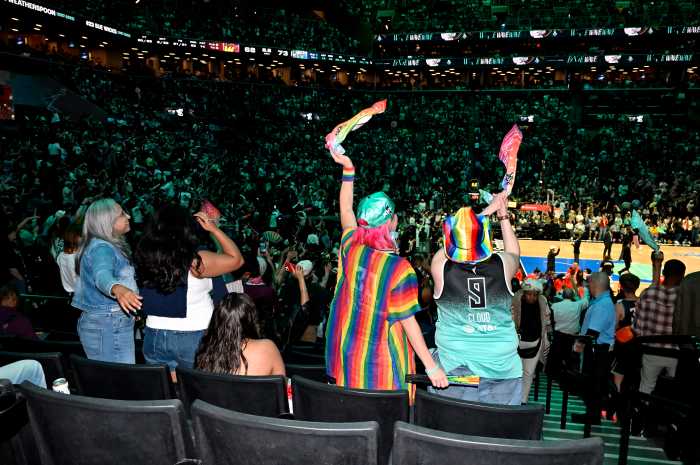 Fans cheer on the New York Liberty on Pride Night in Brooklyn.