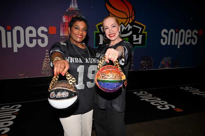 WNBA superfans Tracie and Cheryl Parsa-Brown, known as "The Aunties," enjoy Pride Night.