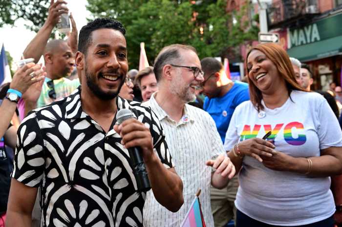 Brooklyn Borough President Antonio Reynoso delivers remarks near Comptroller Mark Levine and Attorney General Letitia James.