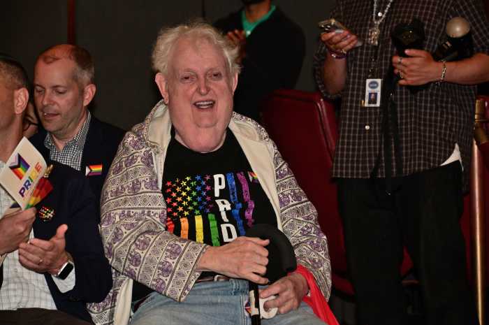 Drag artist Ruby Rims enjoys the show.