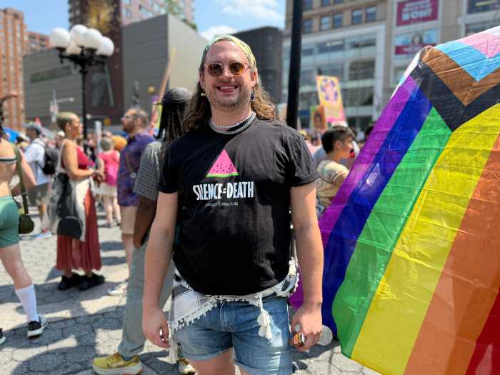 Denton dons an ACT UP shirt at the 2026 Queer Liberation March.
