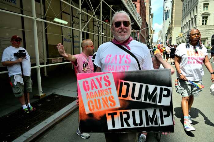 Denouncing President Donald Trump.