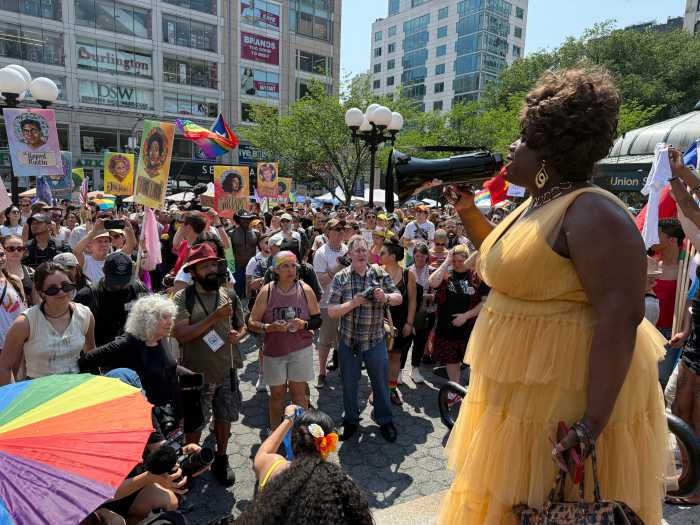 Qween Jean addresses the crowd at the Queer Liberation March.