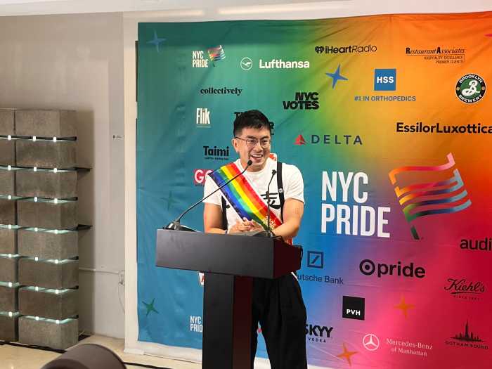 Bowen Yang speaks at NYC Pride's morning press conference.