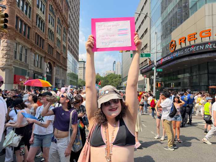 Katie Fink shows her sign at the 2026 Queer Liberation March.