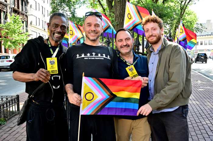 Ken Ard, Basil Twist, Paul Kieve, and Stefano Torella, representing "CATS: The Jellicle Ball," with Rainbow Flags in hand.